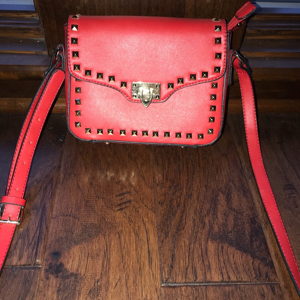 Red leather studded bag